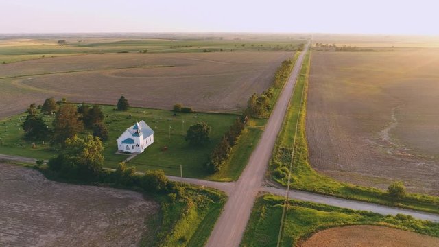 Sunset Aerial of Country Church and Rural Road