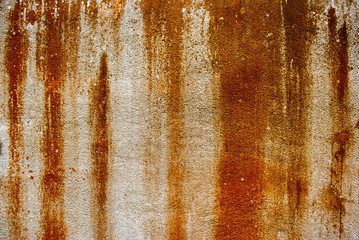 Drip rust on cement wall