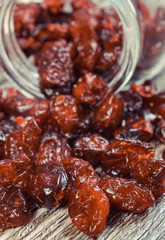 Cranberries as source minerals and fiber. Wooden background