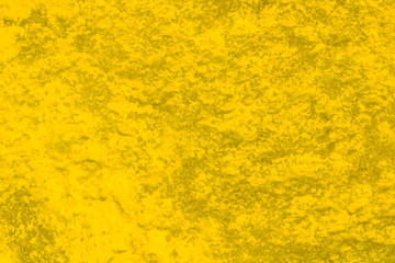 orange golden decorative plaster background, ginger stucco wall with copyspace, abstract wallpaper close up ,yellow texture macro