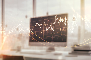 Abstract creative financial graph on modern laptop background, forex and investment concept. Multiexposure