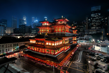 Buddha Toothe Relic Temple in Chinatown in Singapore, with Singapore`s business district in the...