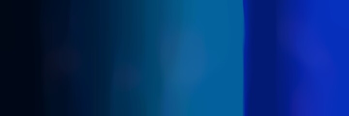 blurred bokeh horizontal background texture with very dark blue, midnight blue and strong blue colors space for text or image