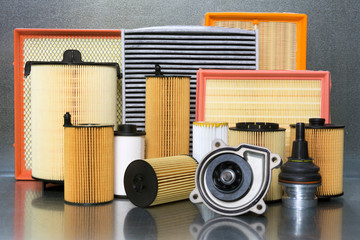 Spare parts and accessories for the car. Filters for a car close-up on a steel background.