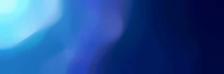 blurred iridescent horizontal background bokeh graphic with royal blue, light sky blue and very dark blue colors. can be used as background for cards or texture