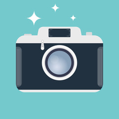 Retro camera. Icon of an old camera isolated on a green background. Vector illustration of a camera.