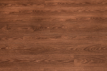 Natural dark brown wooden surface floor texture background.  polished  laminate  parquet