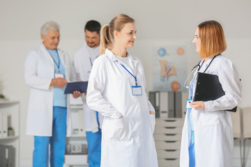 Female doctors discussing something in clinic