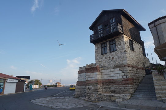 Nesabar, Bulgaria, 8/09/2019. Wooden houses on street of Bulgarian Nesabar at the evening
