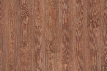 Naklejka premium Natural dark brown wooden surface floor texture background. polished laminate parquet