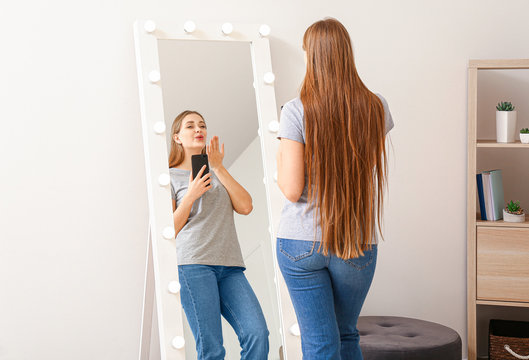 Person Taking Selfie in Mirror