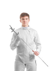 Young male fencer on white background