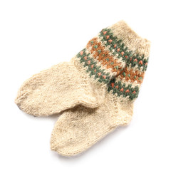 Knitted socks on white background