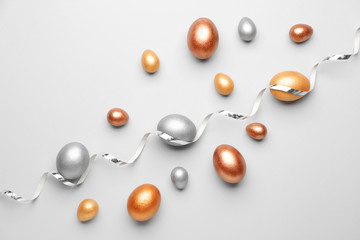 Beautiful Easter eggs on light background