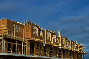 Fragment of  construction of a new private wooden house in a residential area of Richmond City. Construction of the house at the stage of the foundation  