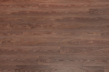 Natural dark brown wooden surface floor texture background.  polished  laminate  parquet