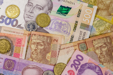 Ukrainian currency. Background of different ukrainian hryvnia banknotes and coins