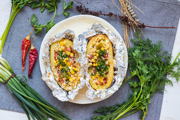 Baked stuffed potato with vegetables inside. Herbs, corn, tomato paste. Vegan healthy diet food. Inspiring and vibrating organic lunch, dinner. No cheese or diary products.