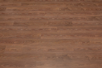 Obraz premium Natural dark brown wooden surface floor texture background. polished laminate parquet
