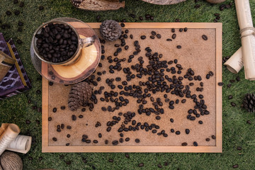 Coffee beans in a transparent cup with props