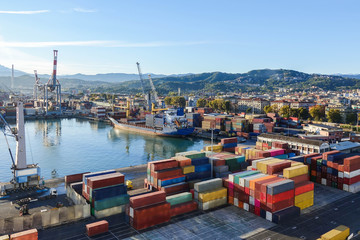 Many containers in shipping harbor, cargo business