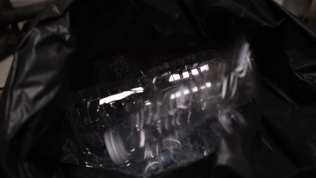 recycle material Separate plastic bottles in to garbage