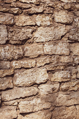 Wall of old stone bricks as a background