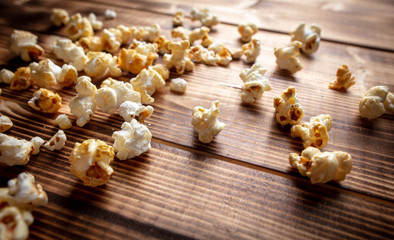 Popcorn flakes on a wooden background