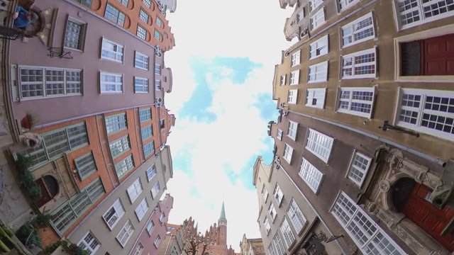 Walking Along Old Town Tenement Houses Looking Up in Gdansk Poland