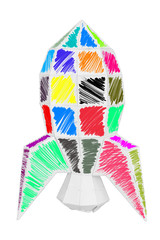 Fototapeta premium Paper rocket colorfully painted isolated on white background for educational folding paper