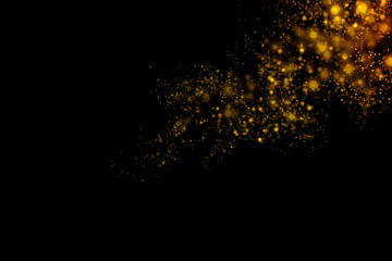 Gold glittering light bokeh abstract particles in dark background.