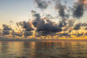 Naklejka na ściany i meble Sunrise over the Indian Ocean on the island of Zanzibar, Tanzania, Africa