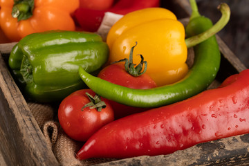 Chilies, peppers and tomatoes in a tray