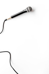 TV news concept. Microphone on white background top-down copy space