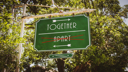 Obraz premium Street Sign to Together versus Apart