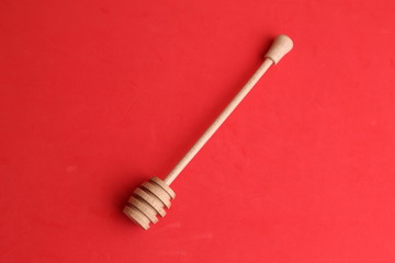 honey stick in color background
