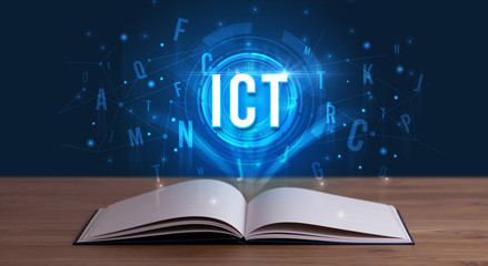 ICT inscription coming out from an open book, digital technology concept