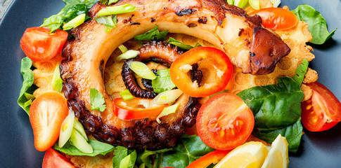 Salad with vegetables and octopus