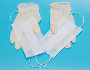 syringe mask gloves on blue background