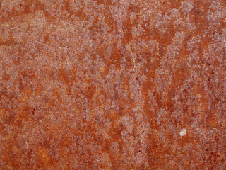 Rust stains on sheet metal.