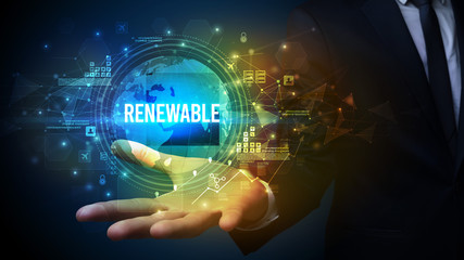 Elegant hand holding RENEWABLE inscription, digital technology concept