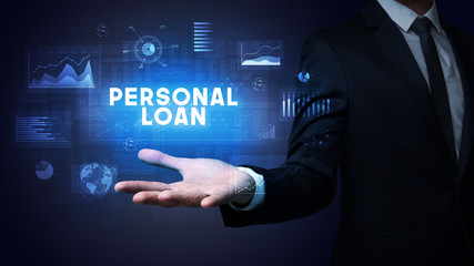 Hand of Businessman holding PERSONAL LOAN inscription, business success concept