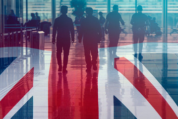 Great Britain Flag as Background and Silhouettes People, concept business picture
