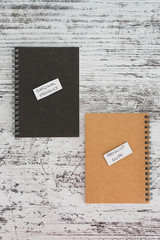 product imitation, Original Product vs Product Dupelabels on similar notebooks in different colors