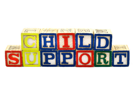 The words Child Support spelled in colorful wooden blocks, isolated on white background