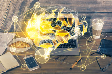 Multi exposure of work table with computer and brain hologram. Brainstorm concept.