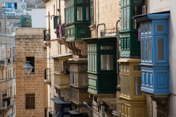 Row of traditional colorful balconies in Malta