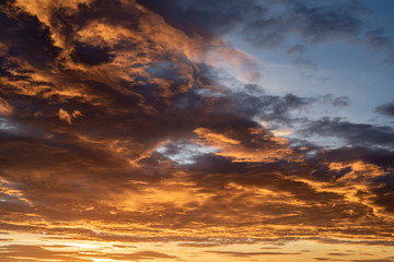 Sunset / sunrise dramatic sky with dark clouds with atmospheric effect