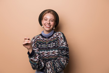 Photo of pretty pleased woman posing and laughing at camera