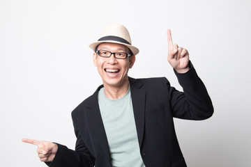 an adult asian man  point with two hands.